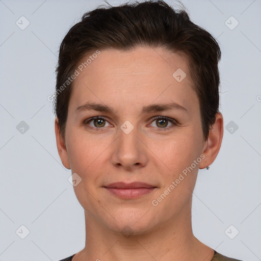 Joyful white young-adult female with short  brown hair and brown eyes