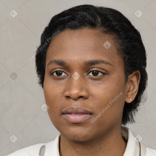 Neutral black young-adult female with short  black hair and brown eyes