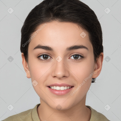 Joyful white young-adult female with short  brown hair and brown eyes