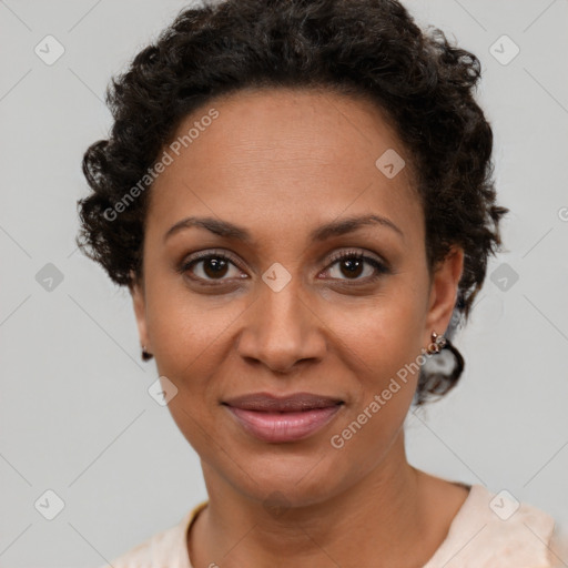 Joyful black young-adult female with short  brown hair and brown eyes