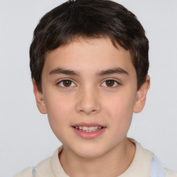 Joyful white child male with short  brown hair and brown eyes