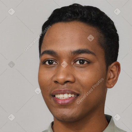 Joyful black young-adult male with short  black hair and brown eyes