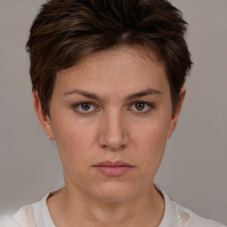 Neutral white young-adult female with short  brown hair and brown eyes