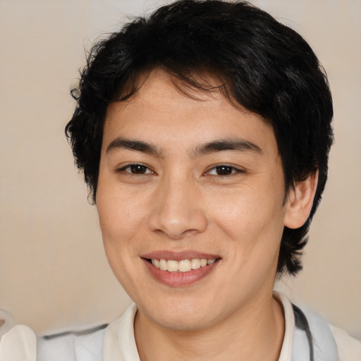 Joyful white young-adult male with medium  brown hair and brown eyes