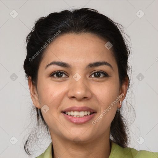 Joyful latino young-adult female with medium  brown hair and brown eyes