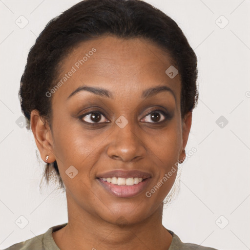 Joyful latino young-adult female with short  brown hair and brown eyes