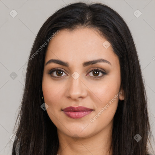 Joyful latino young-adult female with long  brown hair and brown eyes