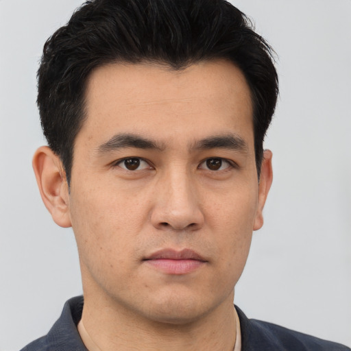 Neutral asian young-adult male with short  black hair and brown eyes