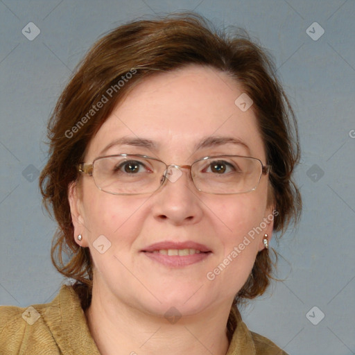 Joyful white adult female with medium  brown hair and blue eyes