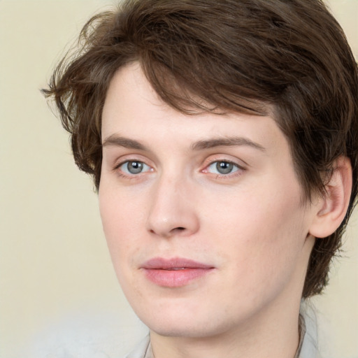 Neutral white young-adult male with medium  brown hair and green eyes