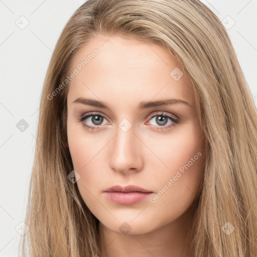 Neutral white young-adult female with long  brown hair and brown eyes