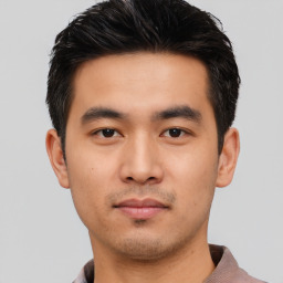 Neutral asian young-adult male with short  black hair and brown eyes