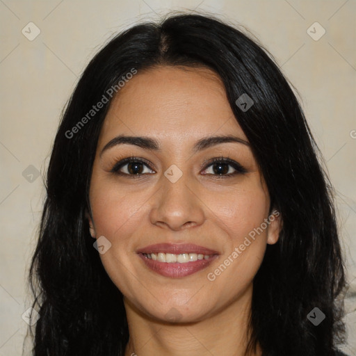 Joyful latino young-adult female with long  black hair and brown eyes