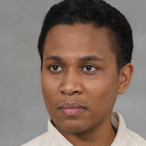 Neutral black young-adult male with short  black hair and brown eyes