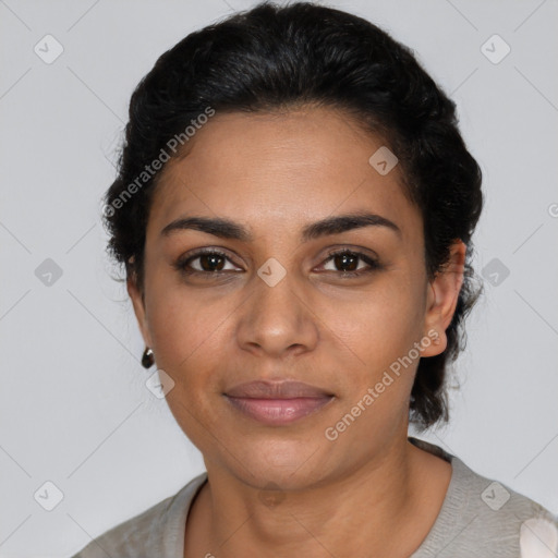 Joyful latino young-adult female with short  black hair and brown eyes