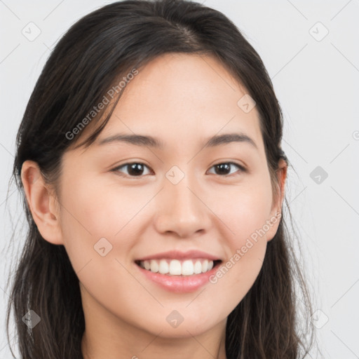 Joyful white young-adult female with long  brown hair and brown eyes