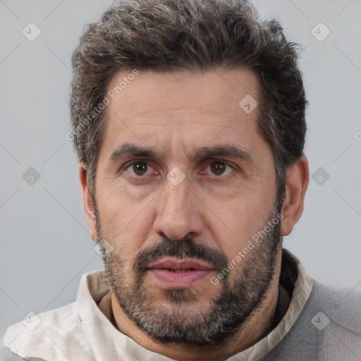 Neutral white adult male with short  brown hair and brown eyes