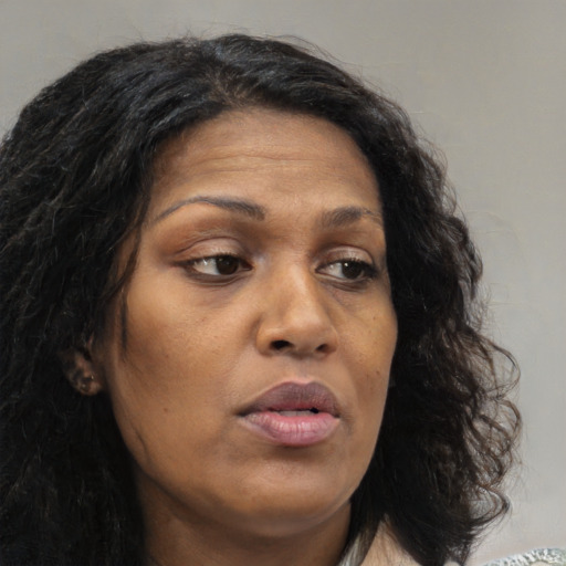 Neutral white adult female with medium  brown hair and brown eyes
