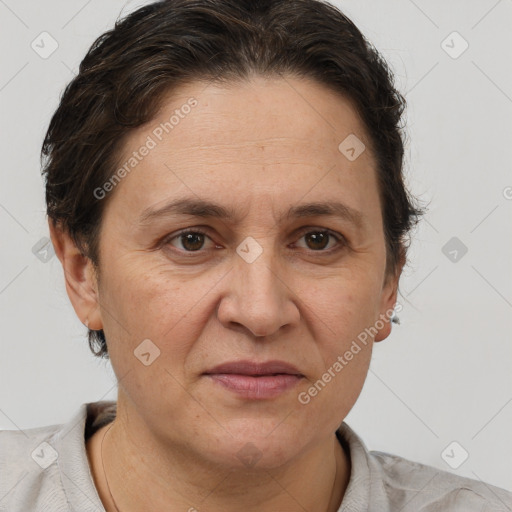 Joyful white adult female with short  brown hair and brown eyes