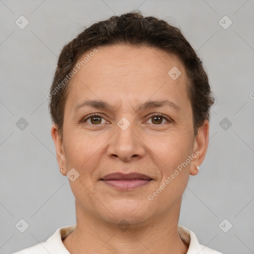 Joyful white adult female with short  brown hair and brown eyes