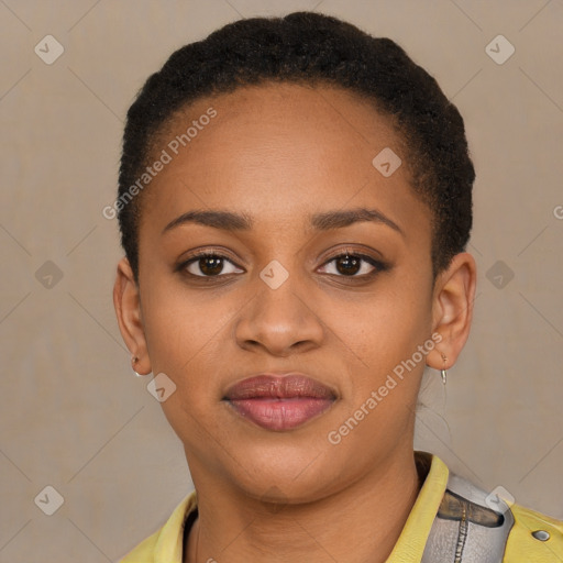 Joyful black young-adult female with short  brown hair and brown eyes