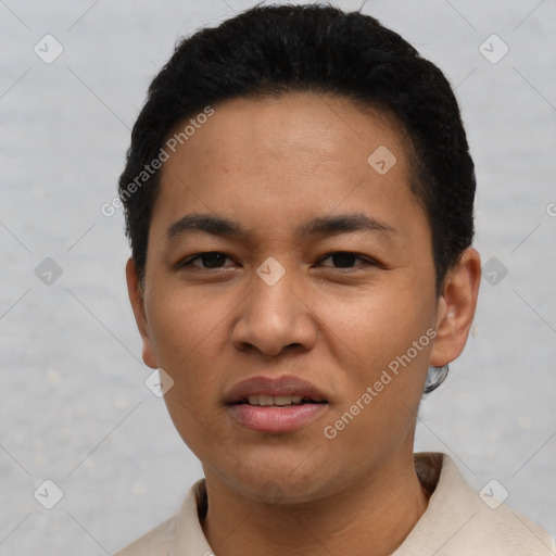 Joyful asian young-adult male with short  black hair and brown eyes