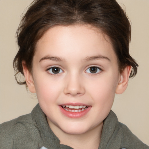 Joyful white child female with medium  brown hair and brown eyes