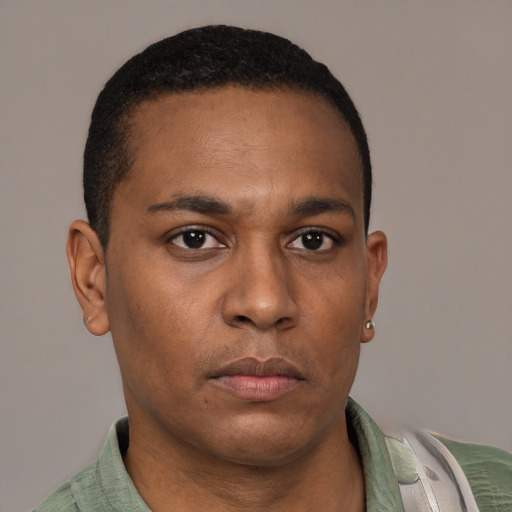 Neutral latino young-adult male with short  brown hair and brown eyes