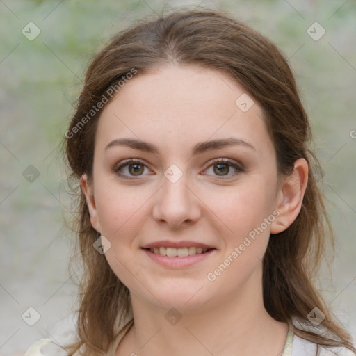 Joyful white young-adult female with medium  brown hair and green eyes