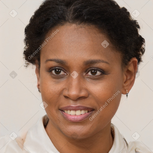 Joyful latino adult female with short  brown hair and brown eyes