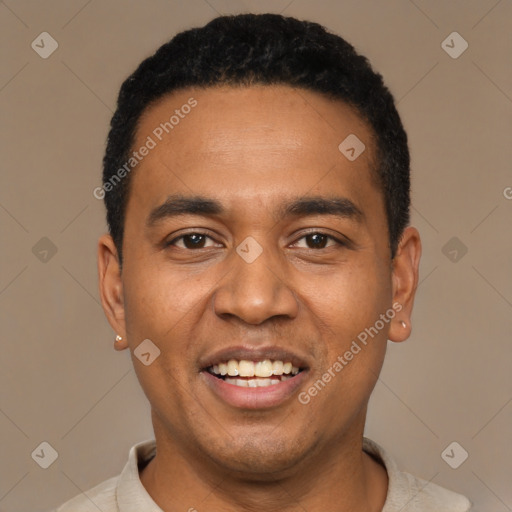 Joyful black young-adult male with short  black hair and brown eyes