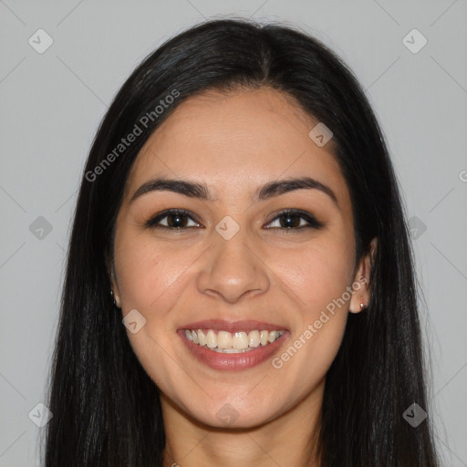 Joyful latino young-adult female with long  brown hair and brown eyes