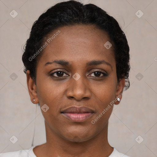 Joyful black young-adult female with short  black hair and brown eyes