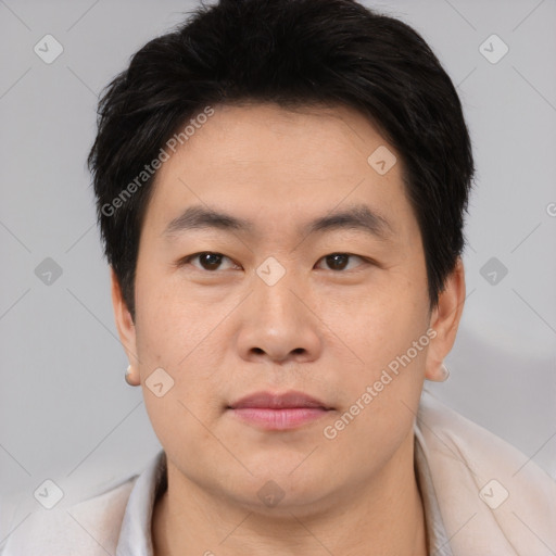 Neutral asian young-adult male with short  black hair and brown eyes