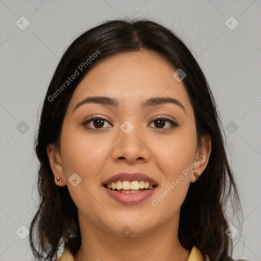 Joyful asian young-adult female with long  brown hair and brown eyes