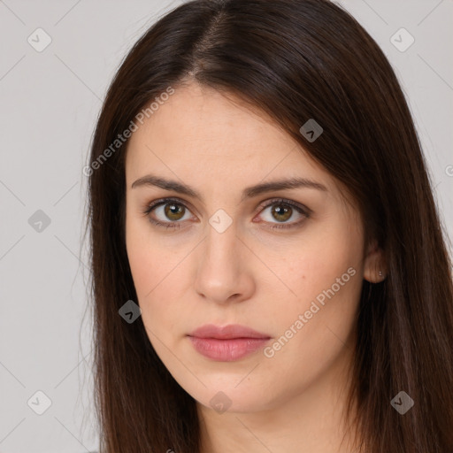 Neutral white young-adult female with long  brown hair and brown eyes