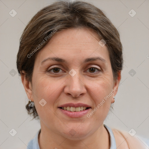 Joyful white adult female with short  brown hair and brown eyes