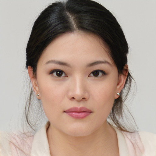 Neutral white young-adult female with medium  brown hair and brown eyes