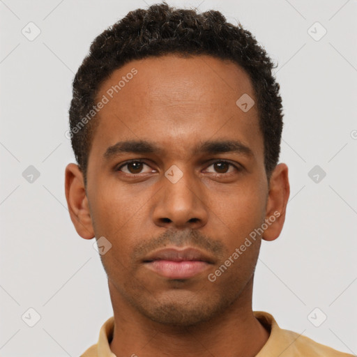Neutral black young-adult male with short  brown hair and brown eyes