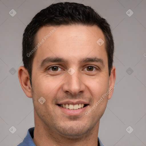 Joyful white young-adult male with short  brown hair and brown eyes