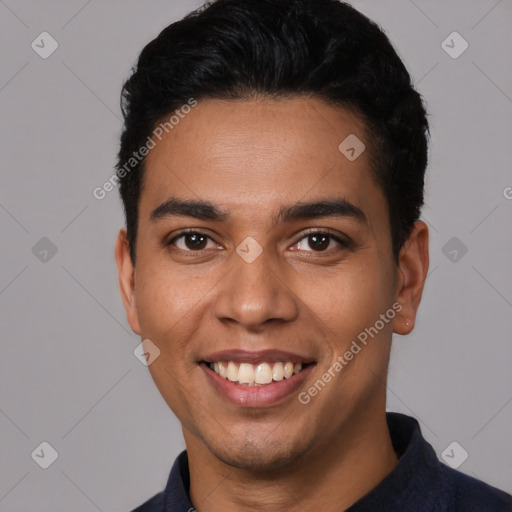 Joyful latino young-adult male with short  black hair and brown eyes