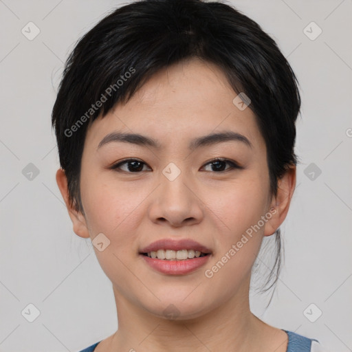 Joyful asian young-adult female with short  black hair and brown eyes