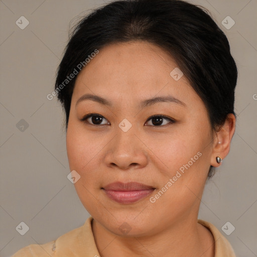 Joyful asian adult female with medium  brown hair and brown eyes