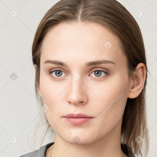 Neutral white young-adult female with medium  brown hair and grey eyes