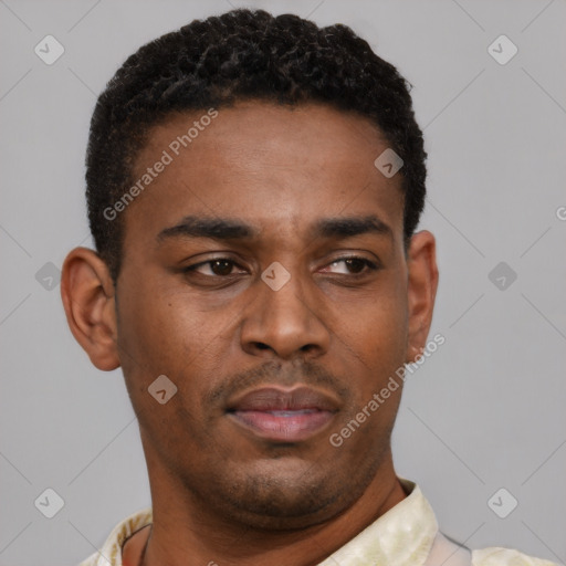 Neutral latino young-adult male with short  black hair and brown eyes