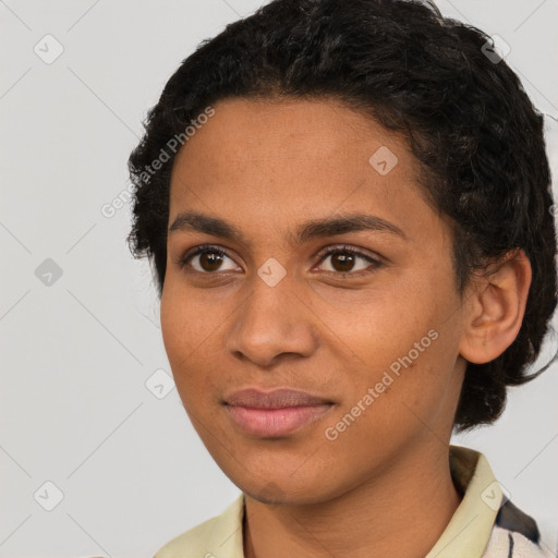 Joyful latino young-adult female with short  brown hair and brown eyes