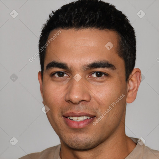 Joyful white young-adult male with short  black hair and brown eyes