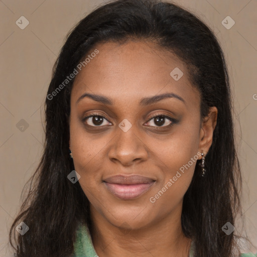 Joyful black young-adult female with long  brown hair and brown eyes