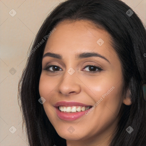 Joyful white young-adult female with long  black hair and brown eyes