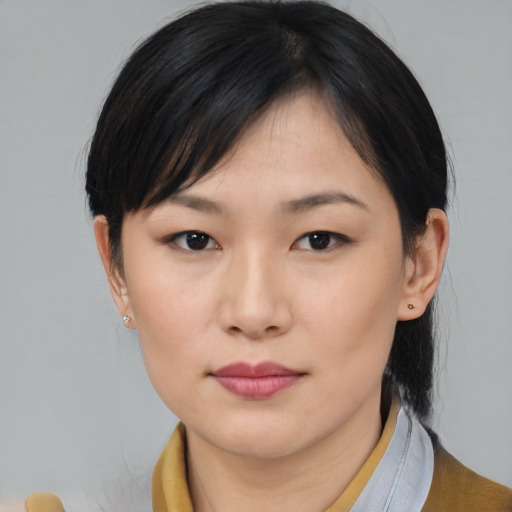 Neutral asian young-adult female with medium  black hair and brown eyes